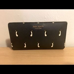New with tags never used KATE SPADE Cameron large bifold slim penguin wallet